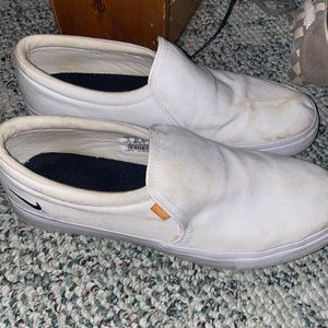 Nike white slip on’s